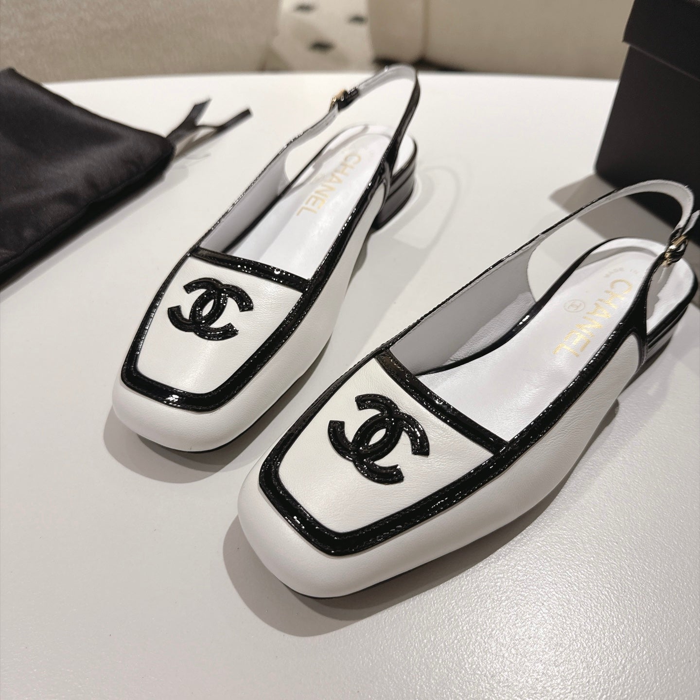 White & Black Fall Winter 2026 Pre-Collection Slingbacks