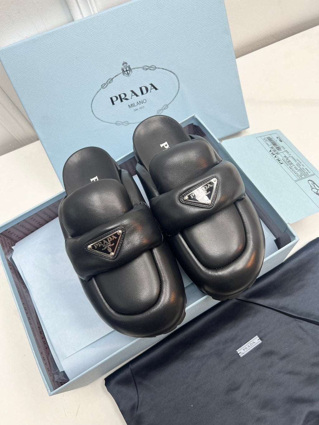 Black P soft padded leather sabots