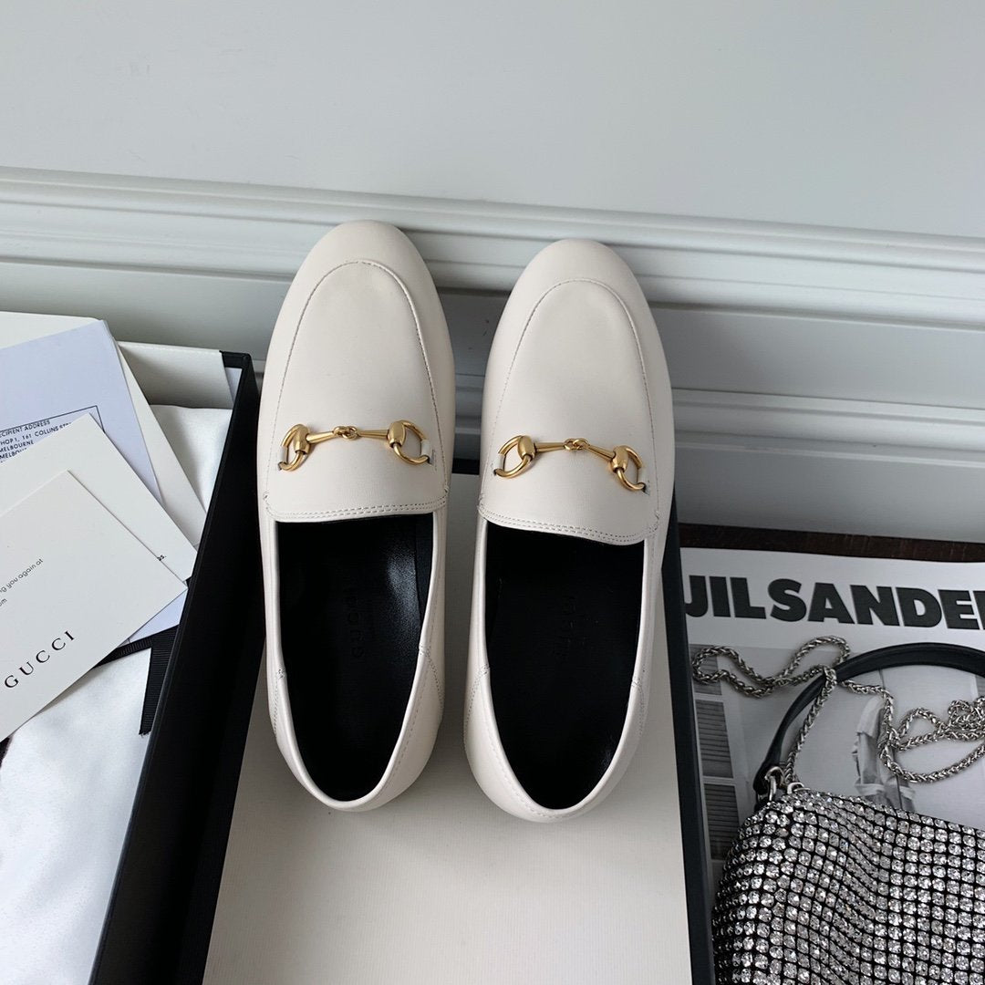 White leather loafer