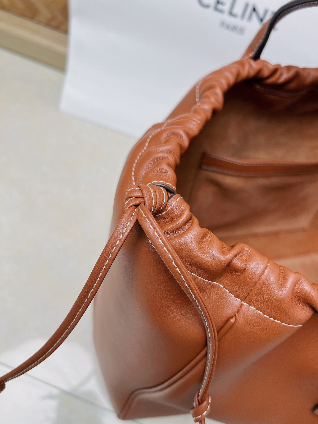 Tan Cabas Drawstring Triomphe