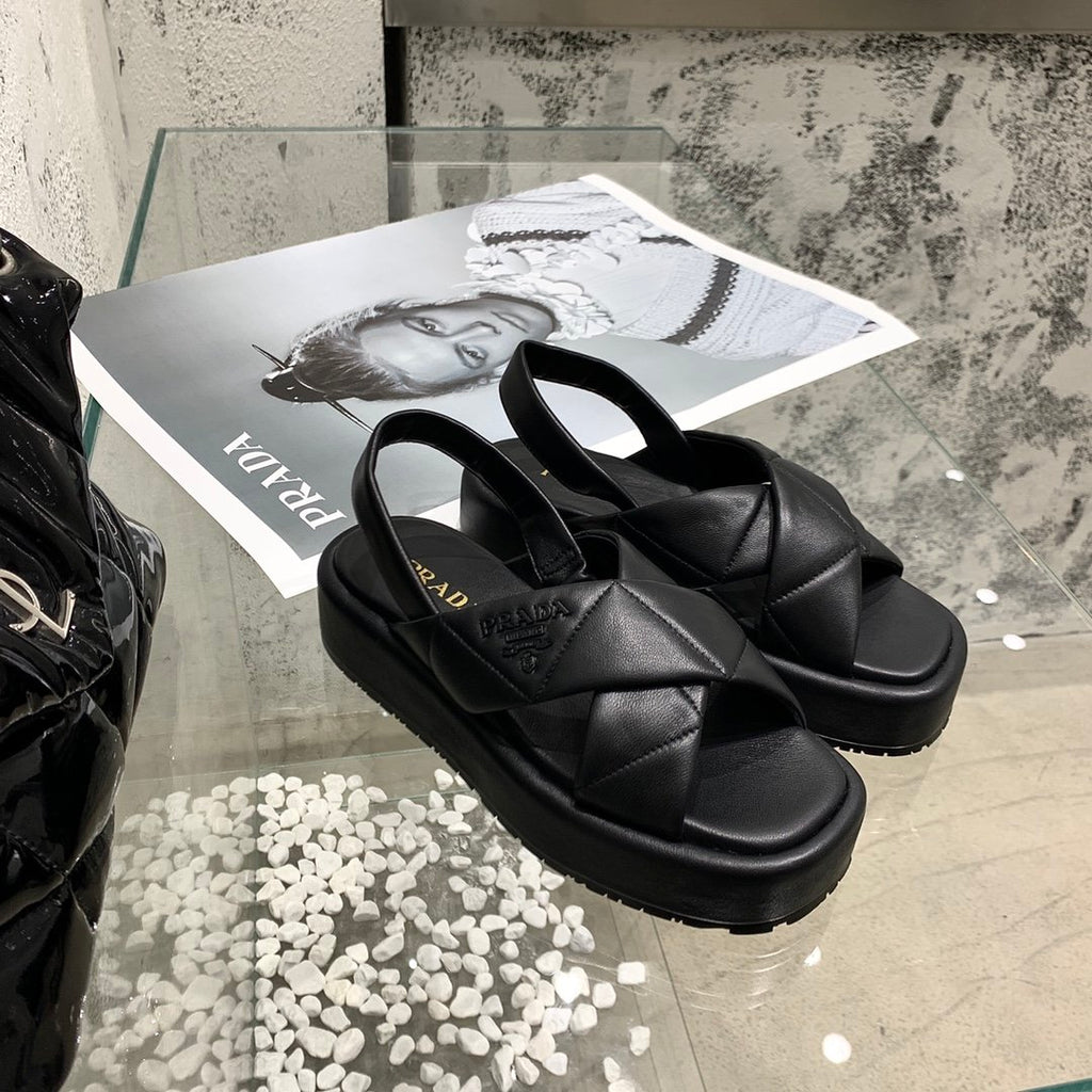 Black quilted flatform sandals