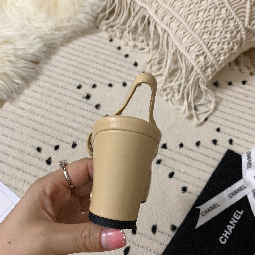 Beige & black CC sling-back