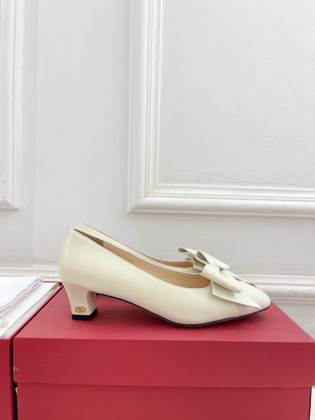 Ivory Bowow Pumps