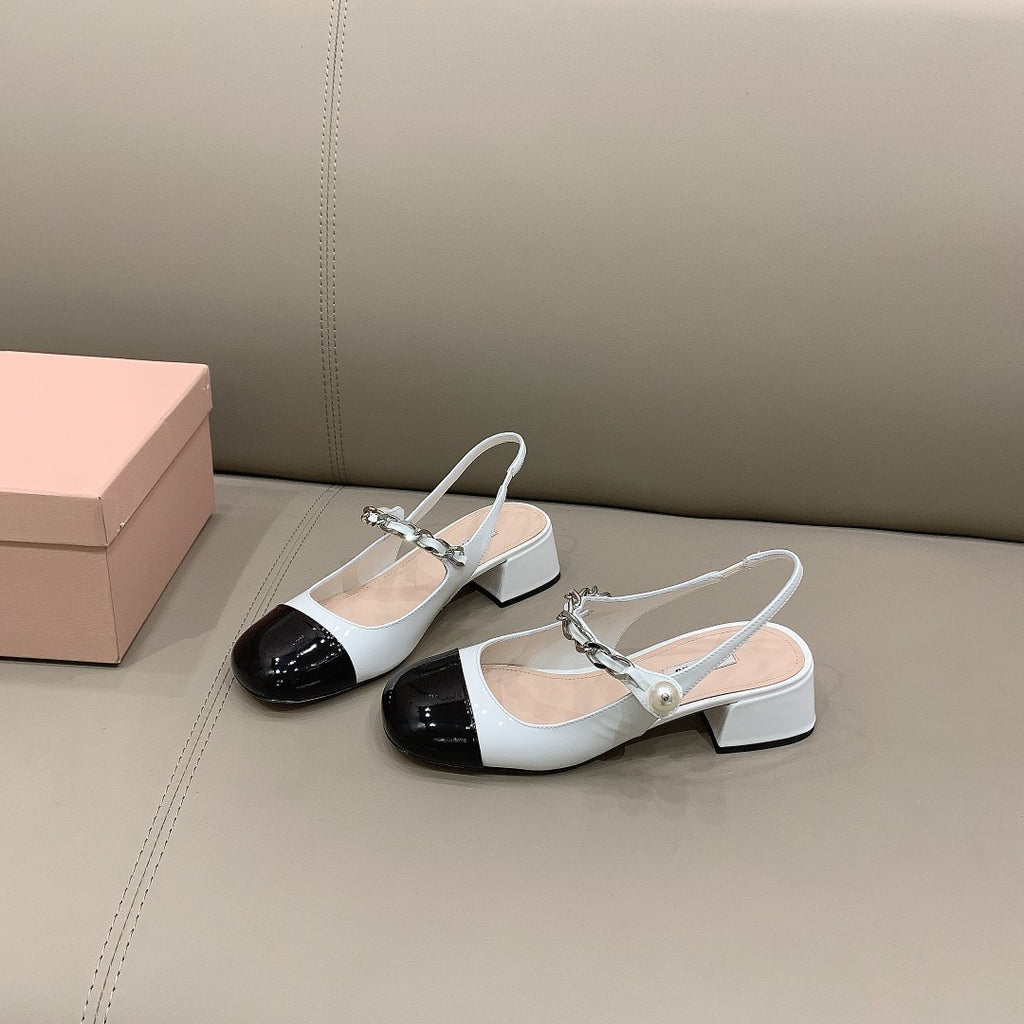 Black & white MM patent leather pumps