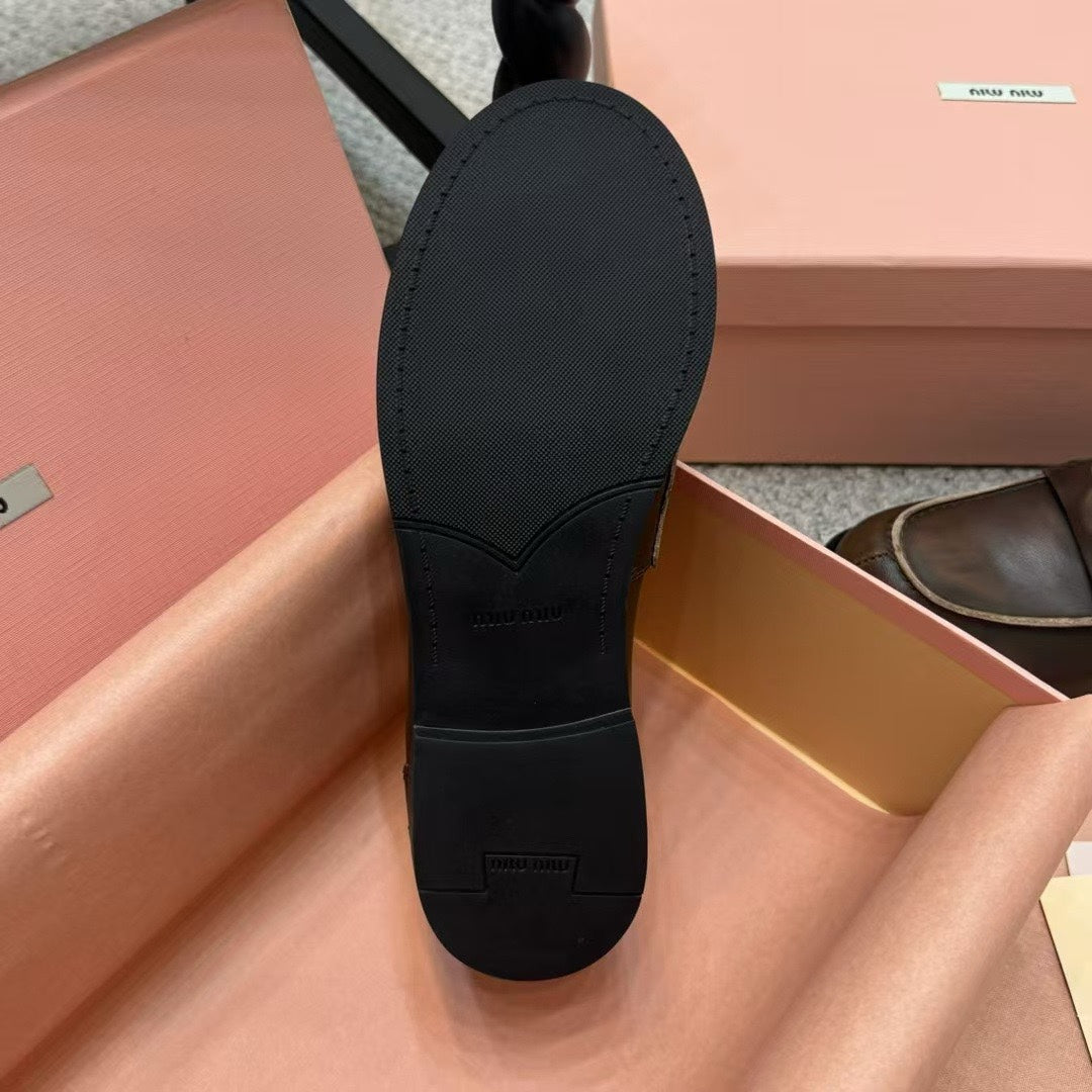 Ebony Vintage-Effect Leather Penny Loafers