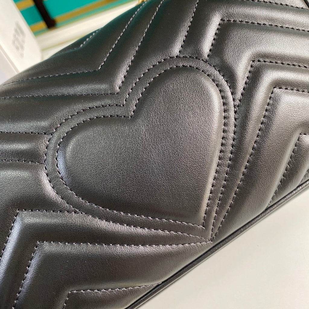 Black GM mini shoulder bag