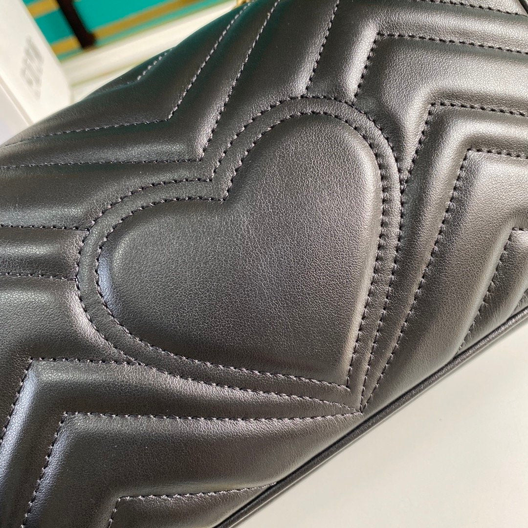 Black GM mini shoulder bag