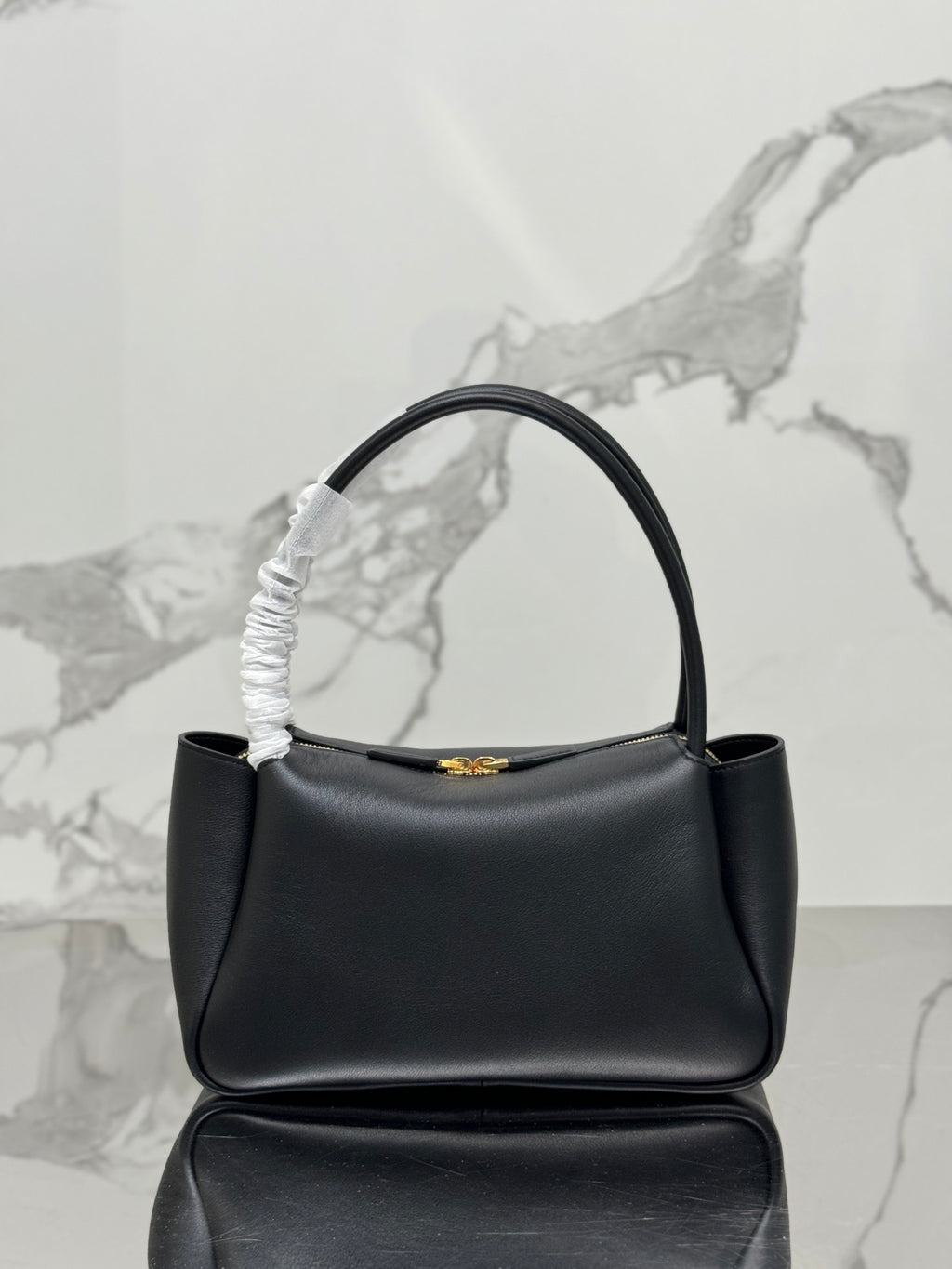 Black P Medium Leather Handbag