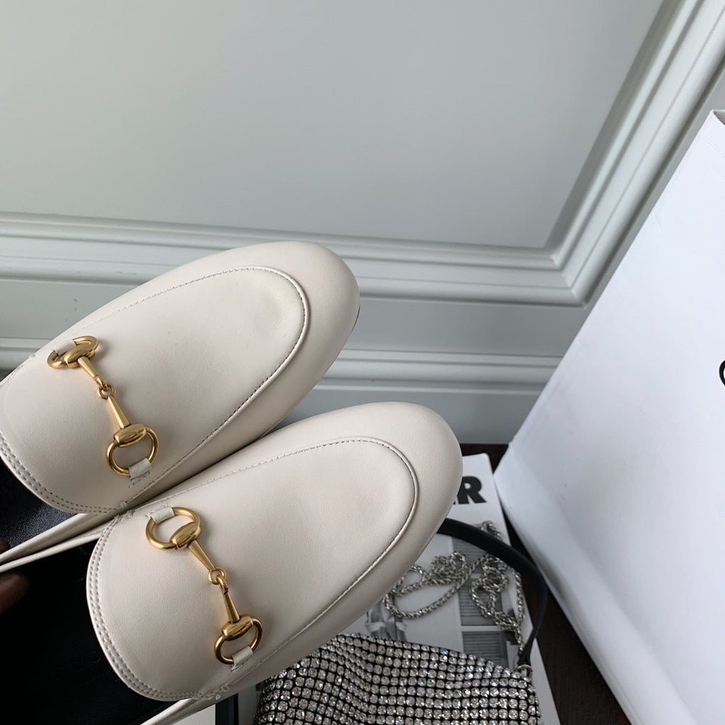White leather loafer
