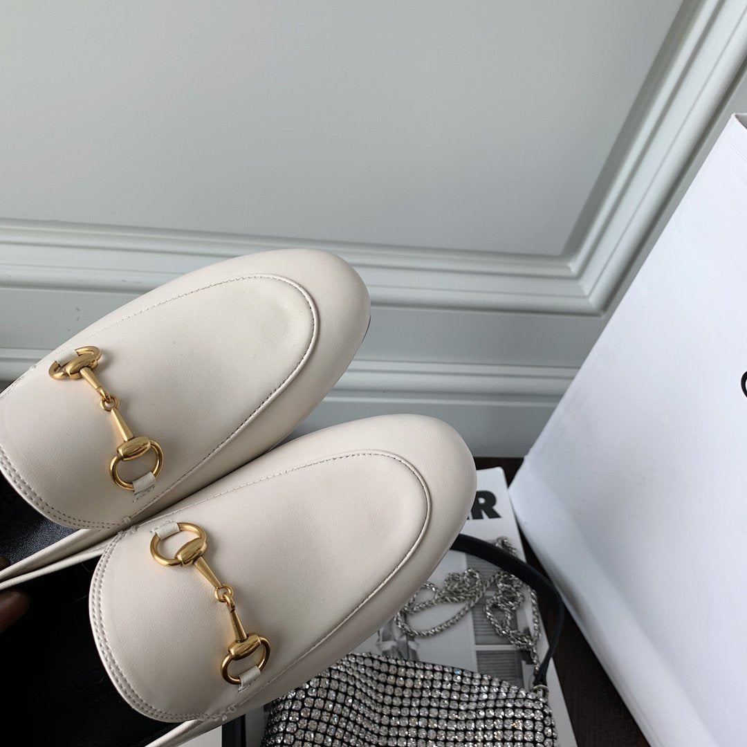 White leather loafer