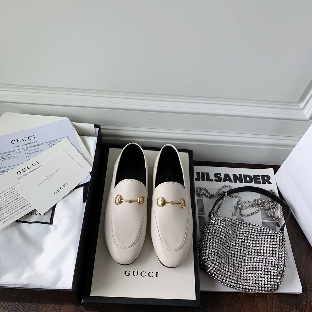 White leather loafer