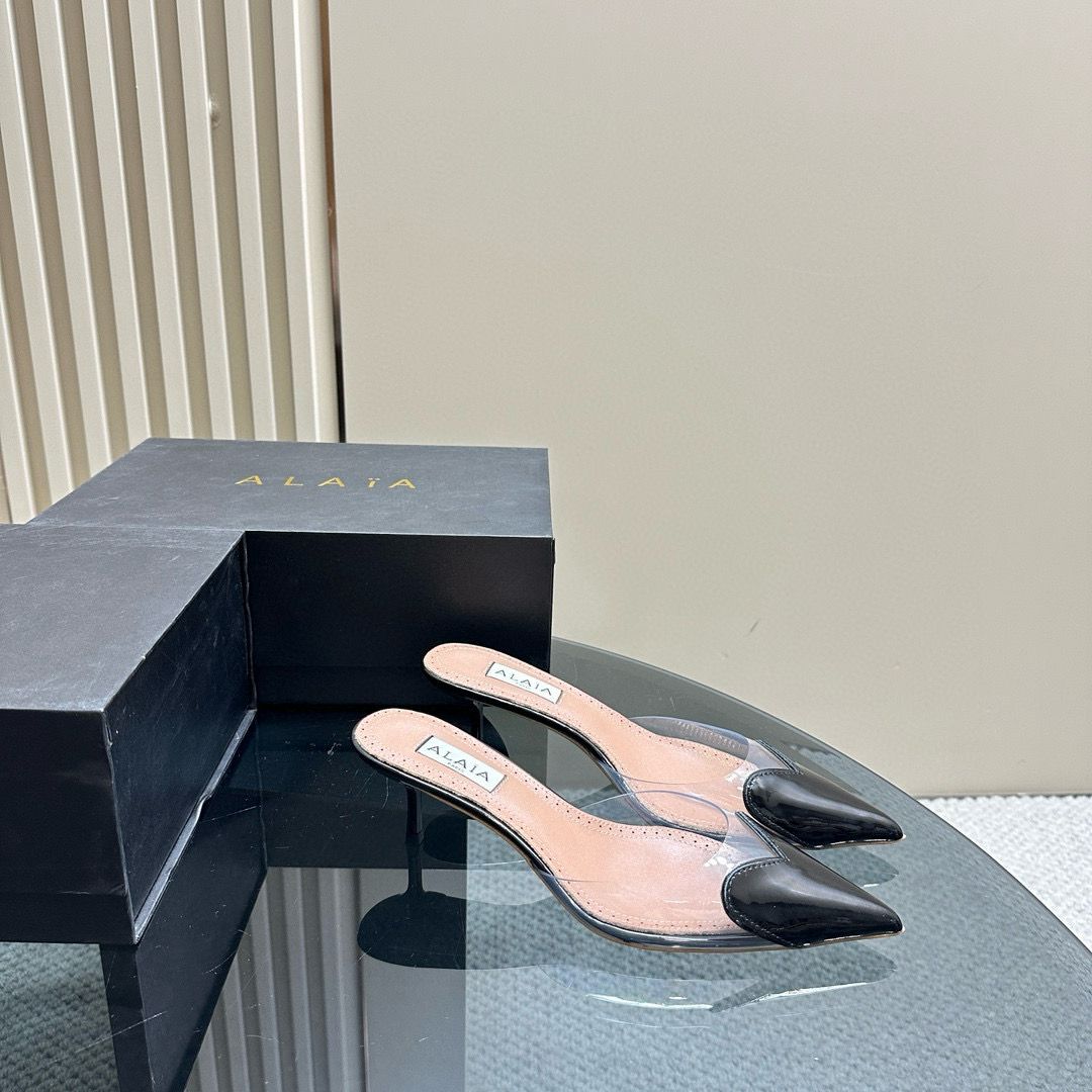 Black LC Mules In Patent Leather