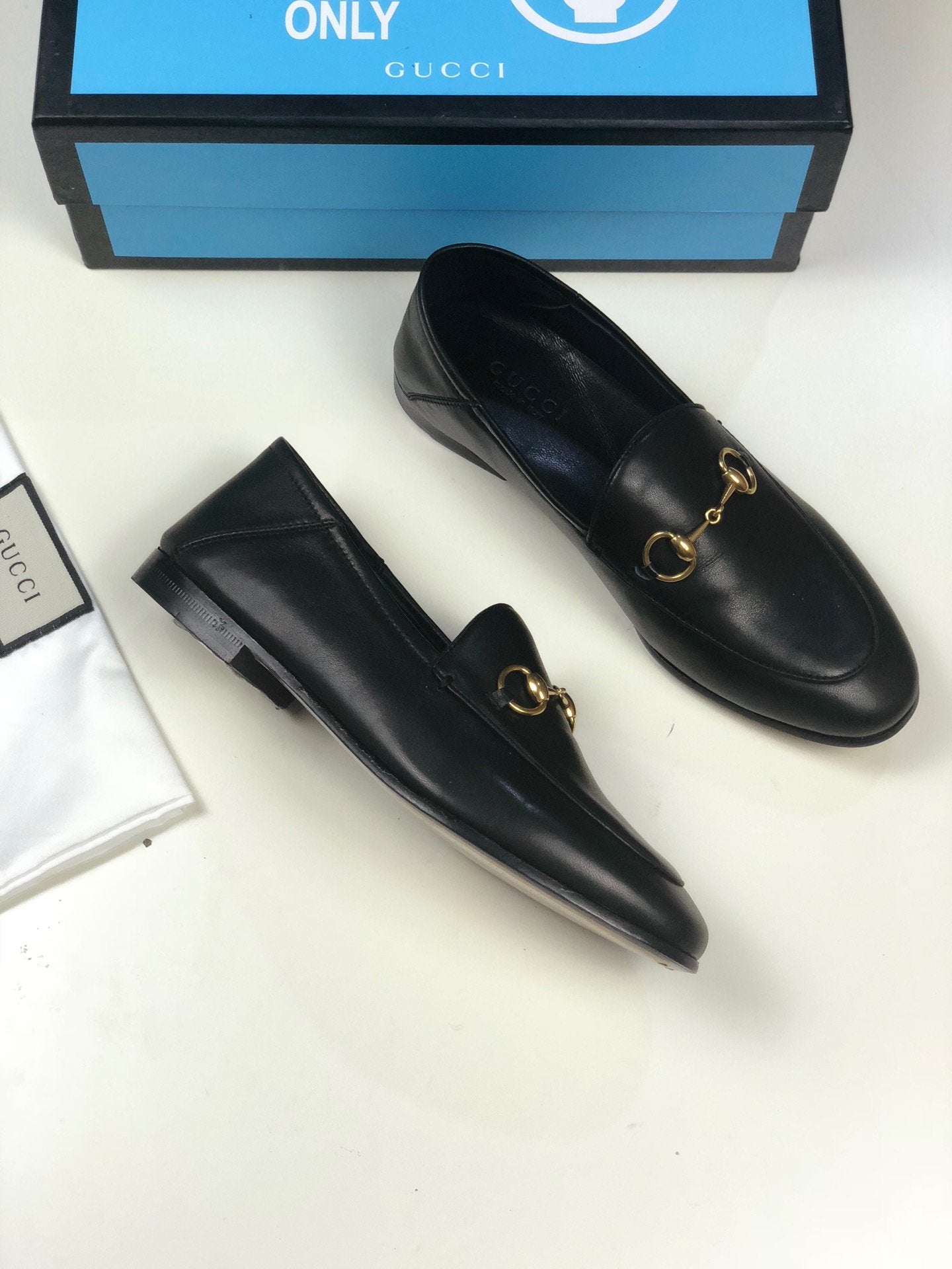 Black GB leather collapsible-heel loafers