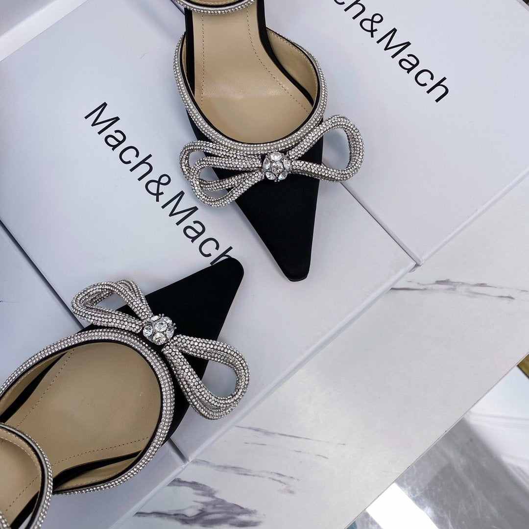 Black double bow pumps