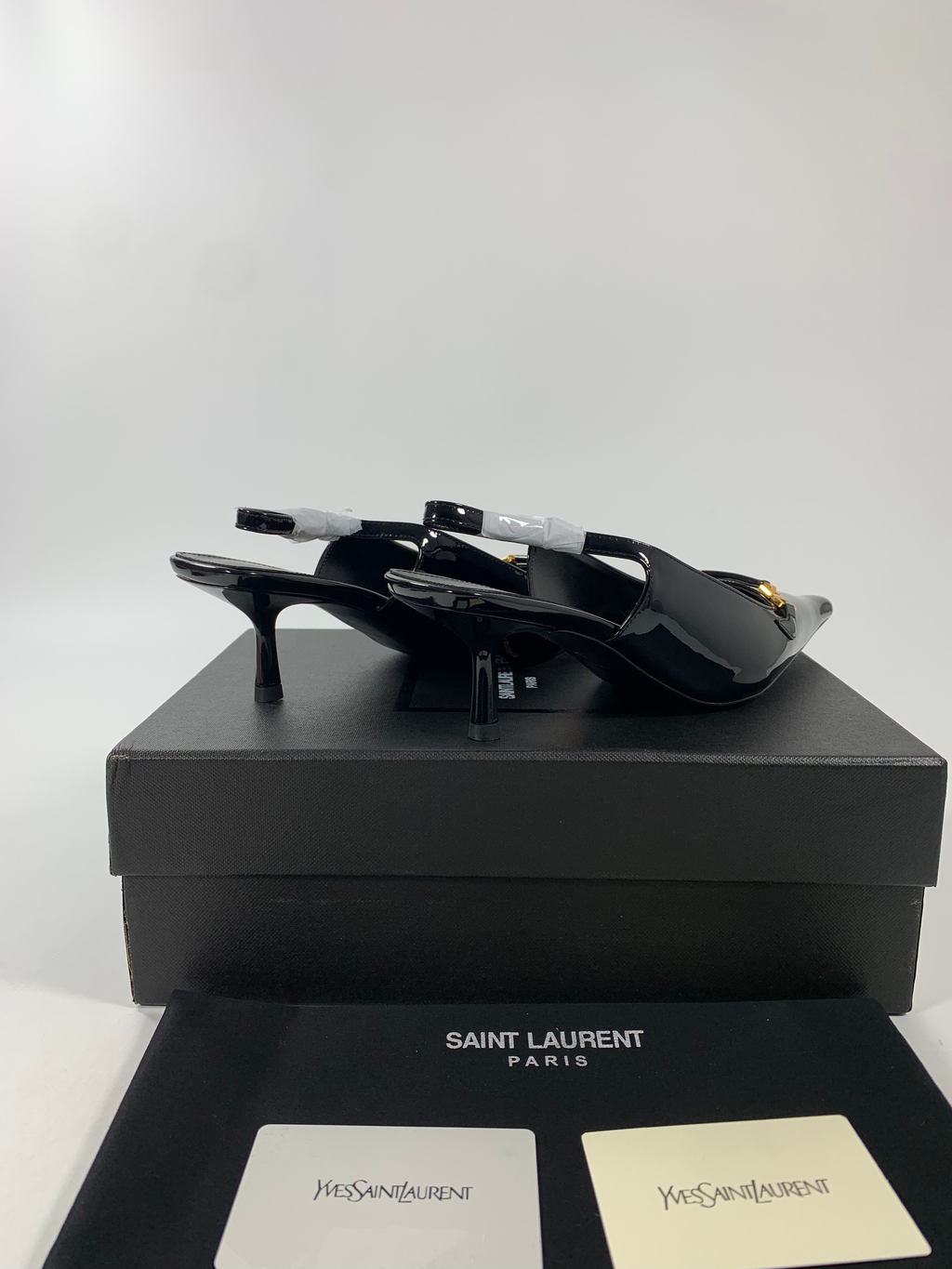 Black YC Slingback Pumps In Patent Leathe