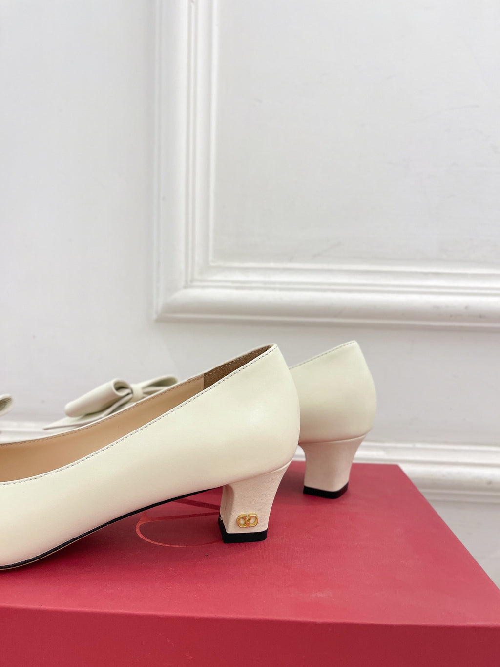Ivory Bowow Pumps