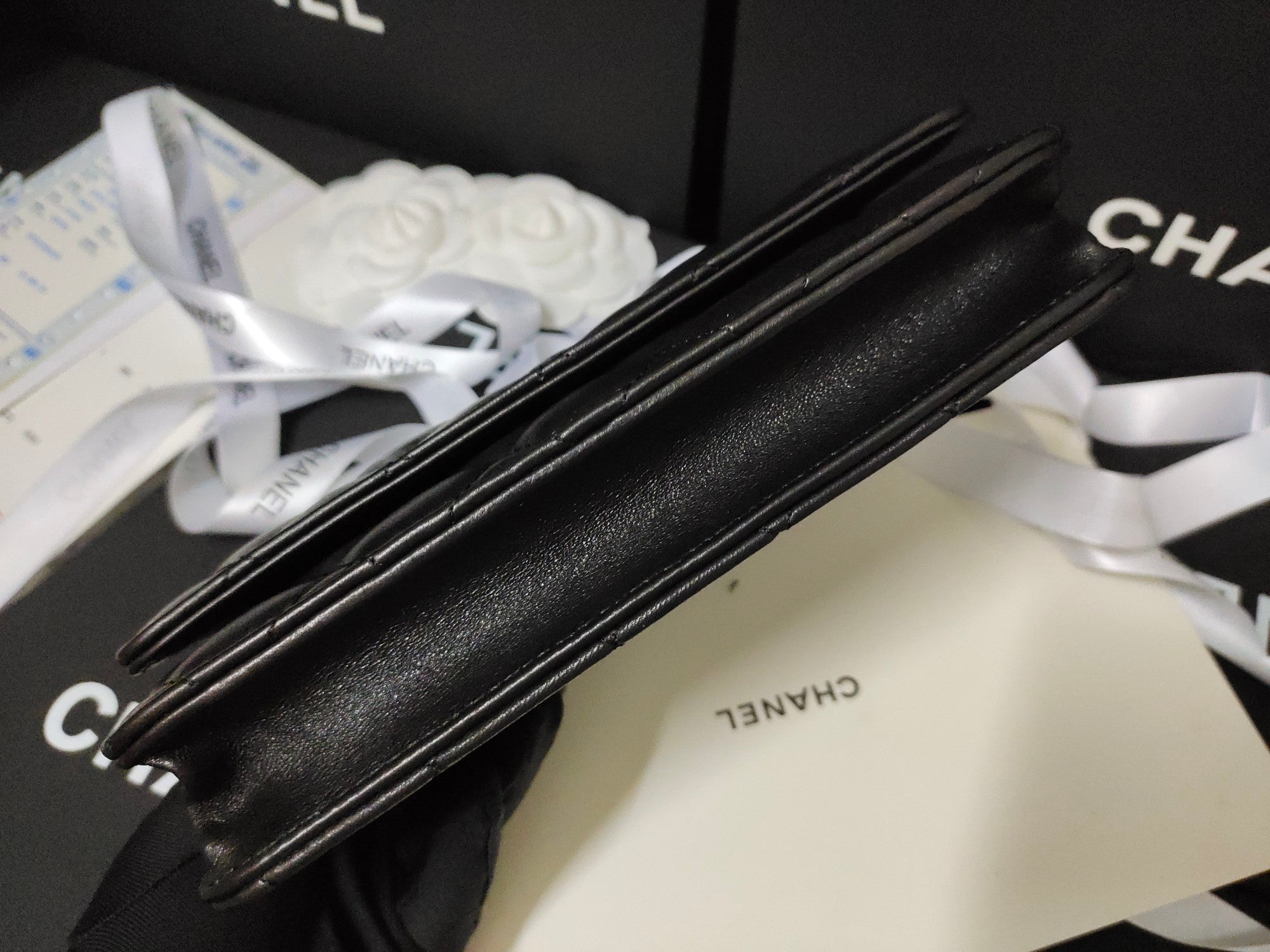 Black classic wallet on chain