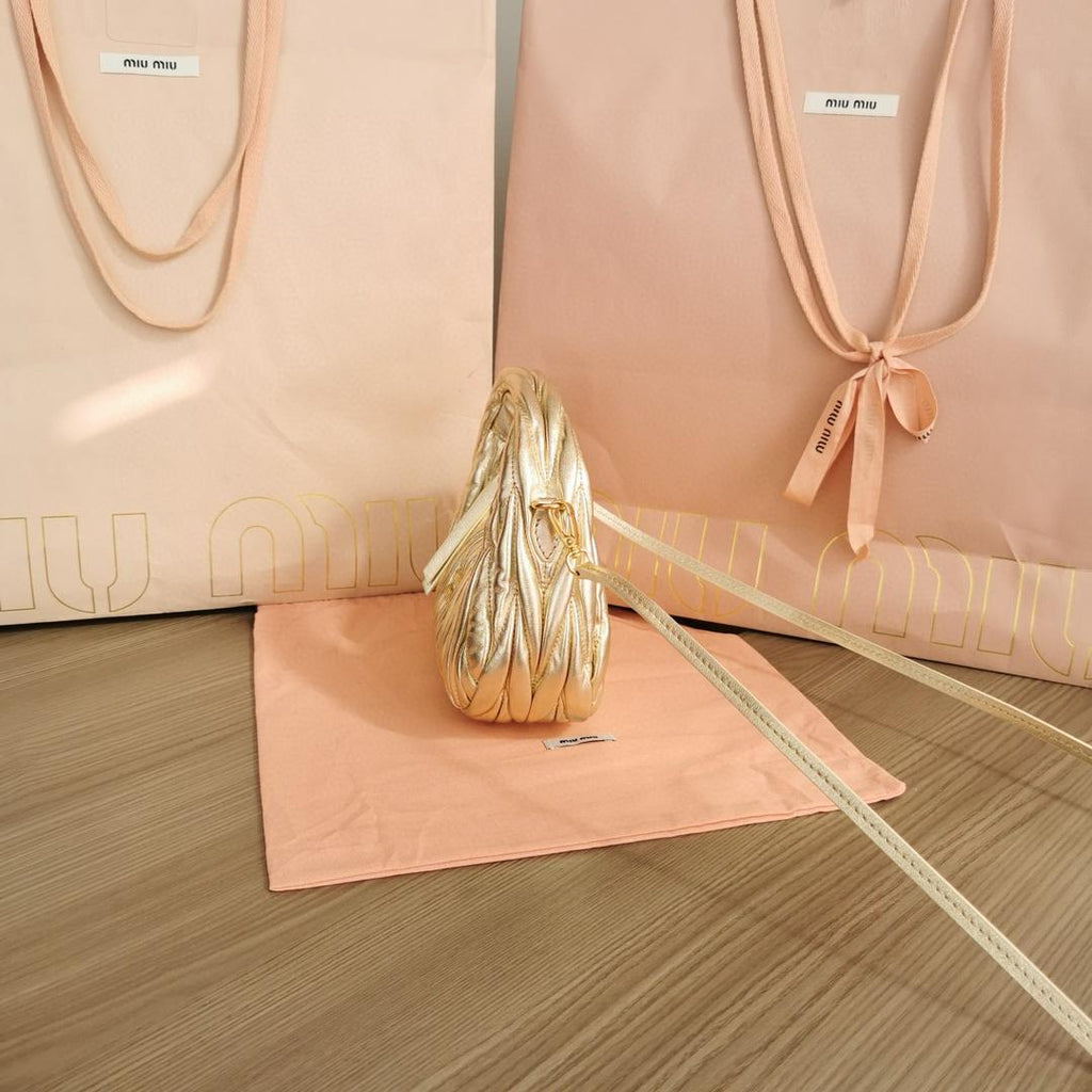 Gold Wander Matelassé Leather Mini Hobo Bag