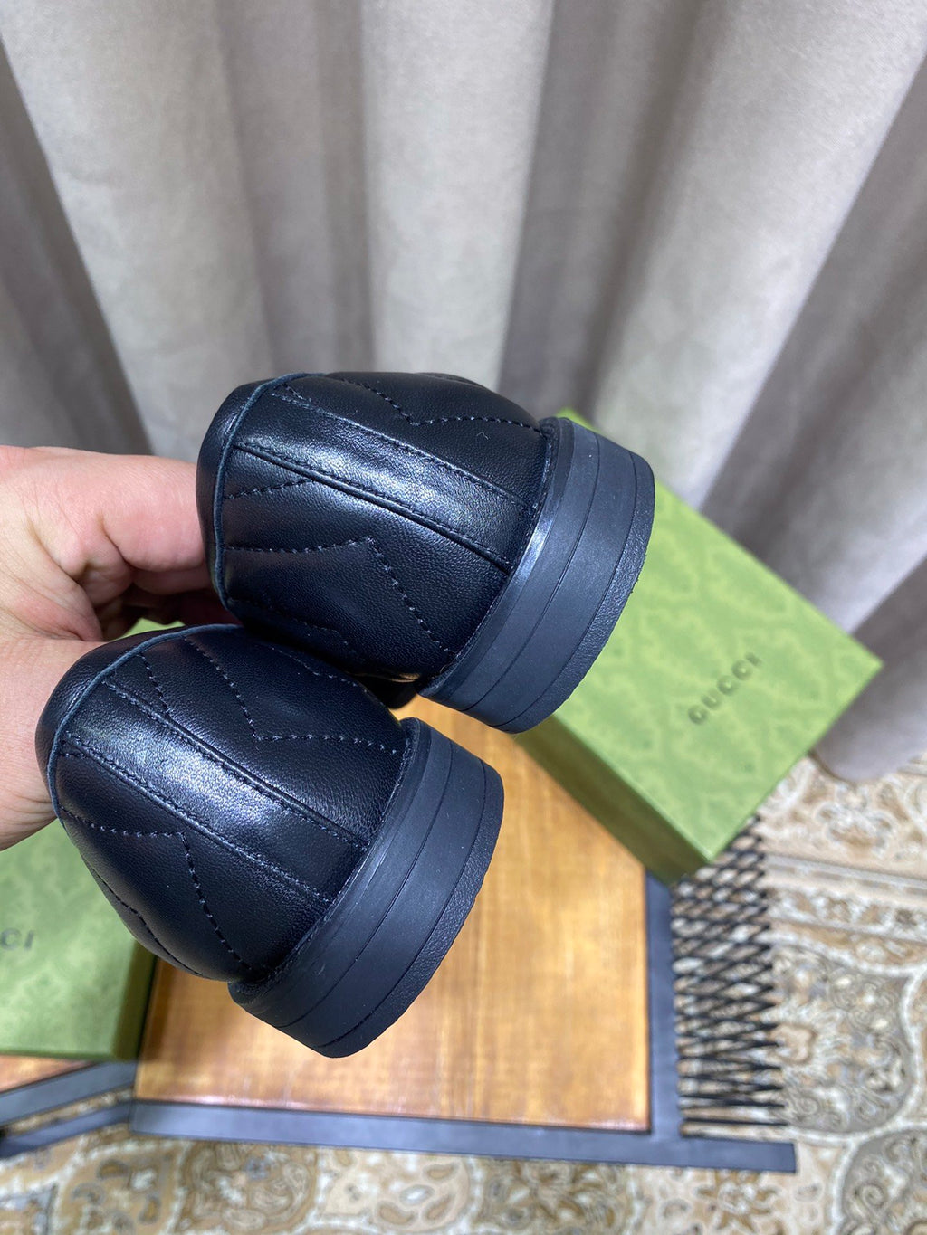 Black chevron matelassé loafers