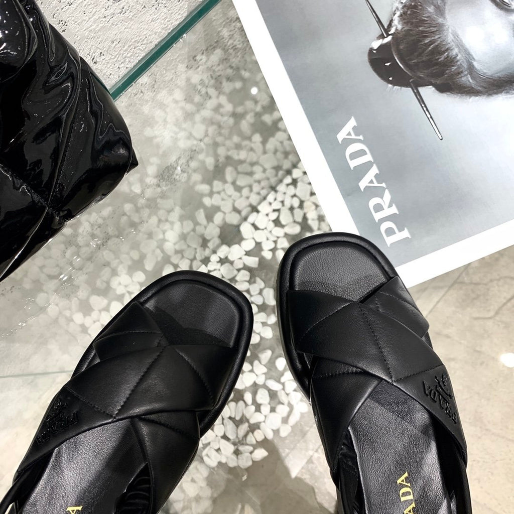 Black quilted flatform sandals