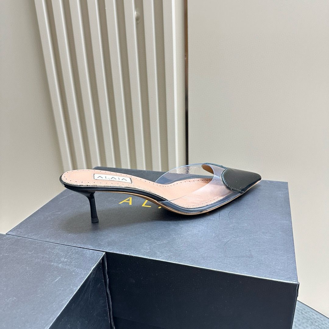 Black LC Mules In Patent Leather