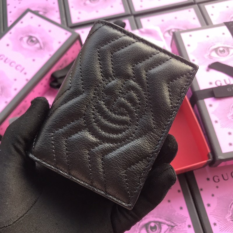 GM small quilted leather wallet