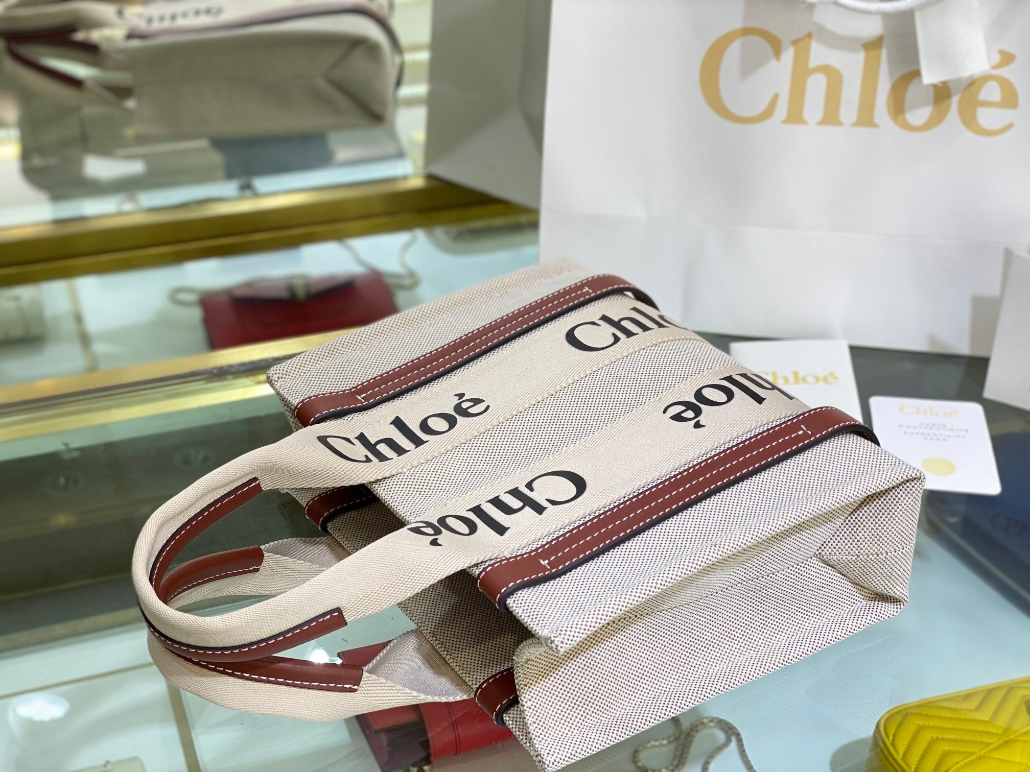 CW small brown leather-trimmed cotton-canvas tote