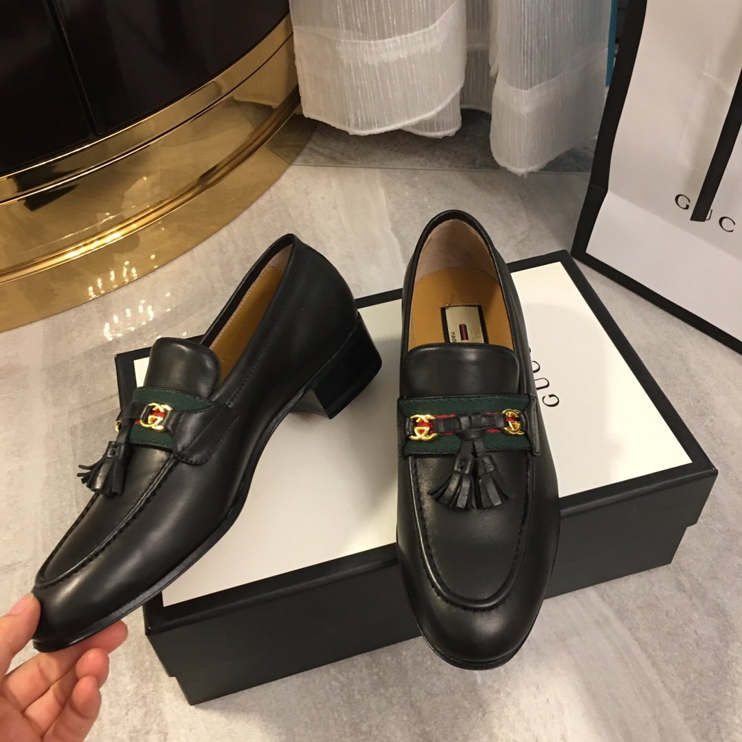 Black loafer with web