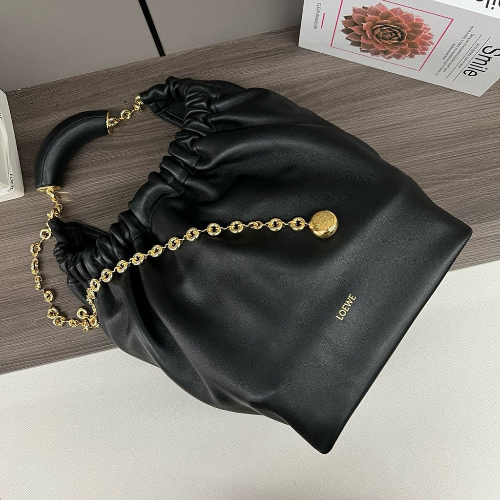 Black Medium Squeeze Bag