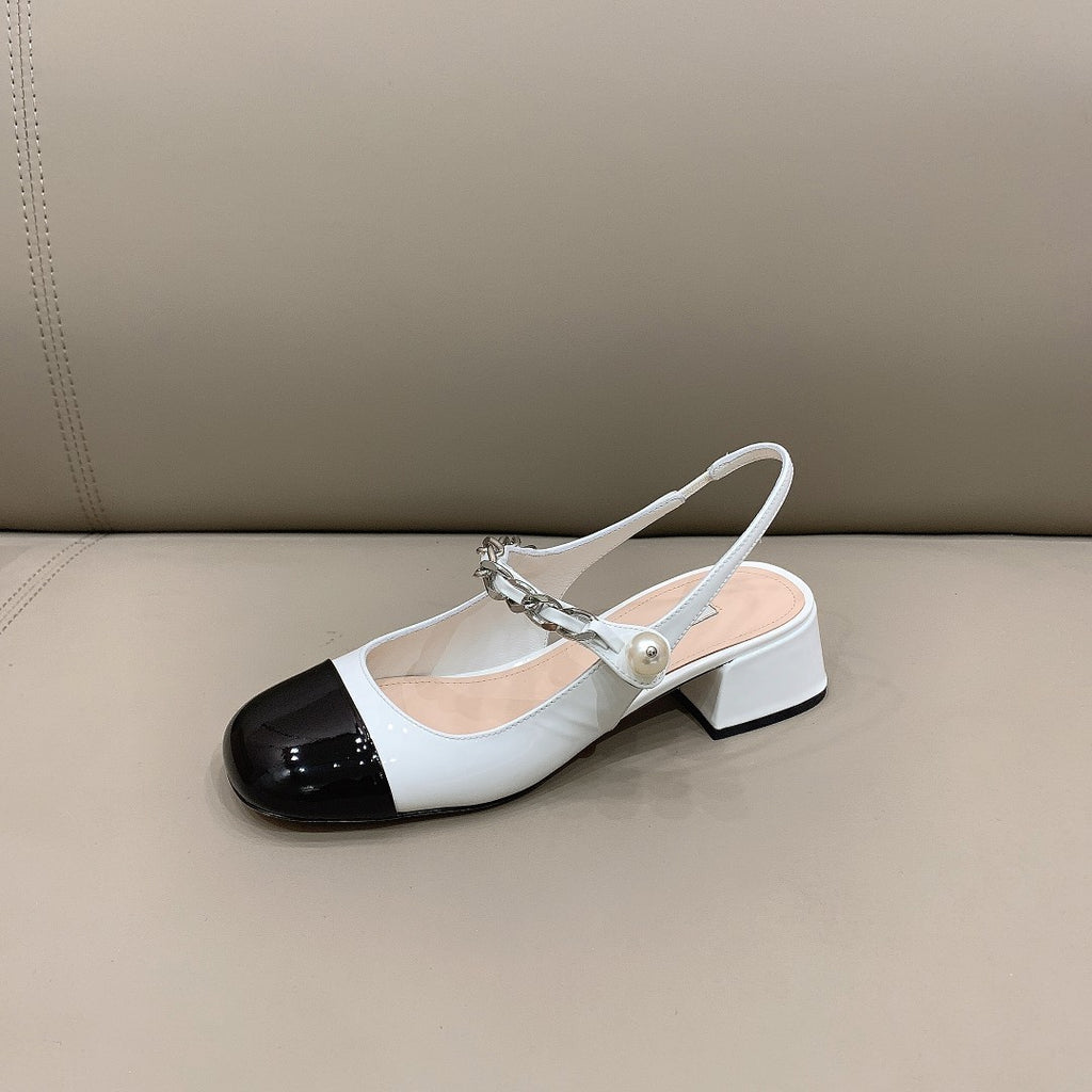 Black & white MM patent leather pumps