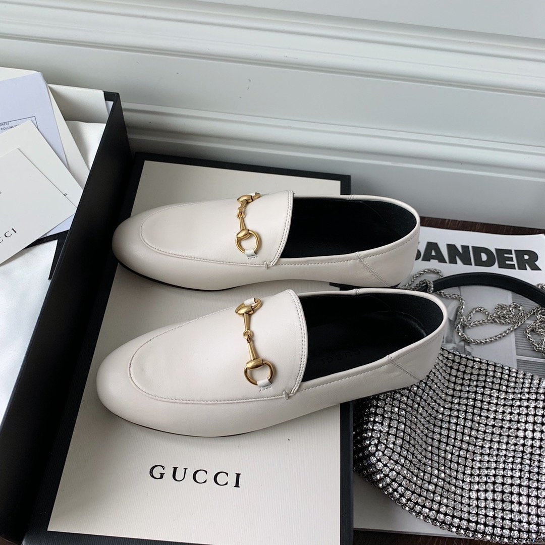 White leather loafer