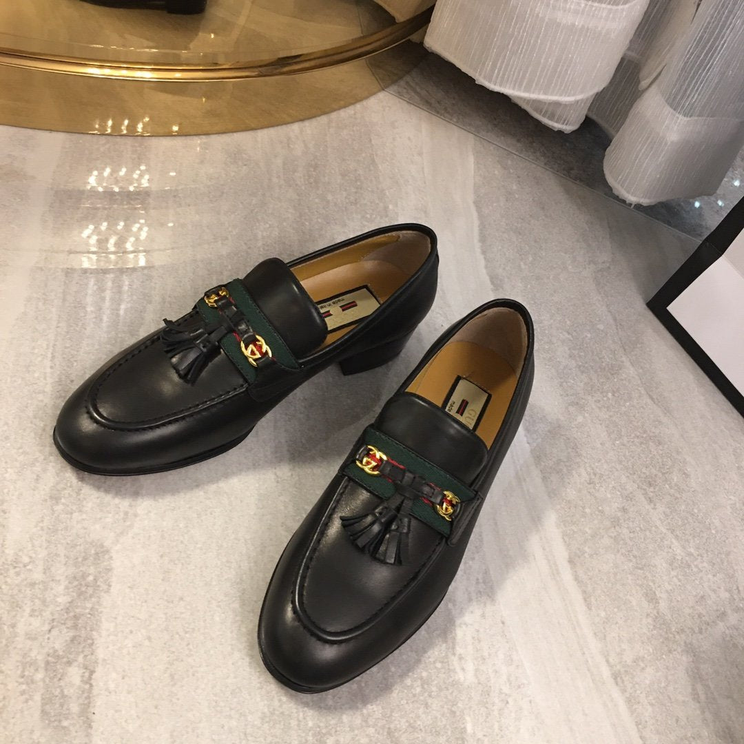 Black loafer with web