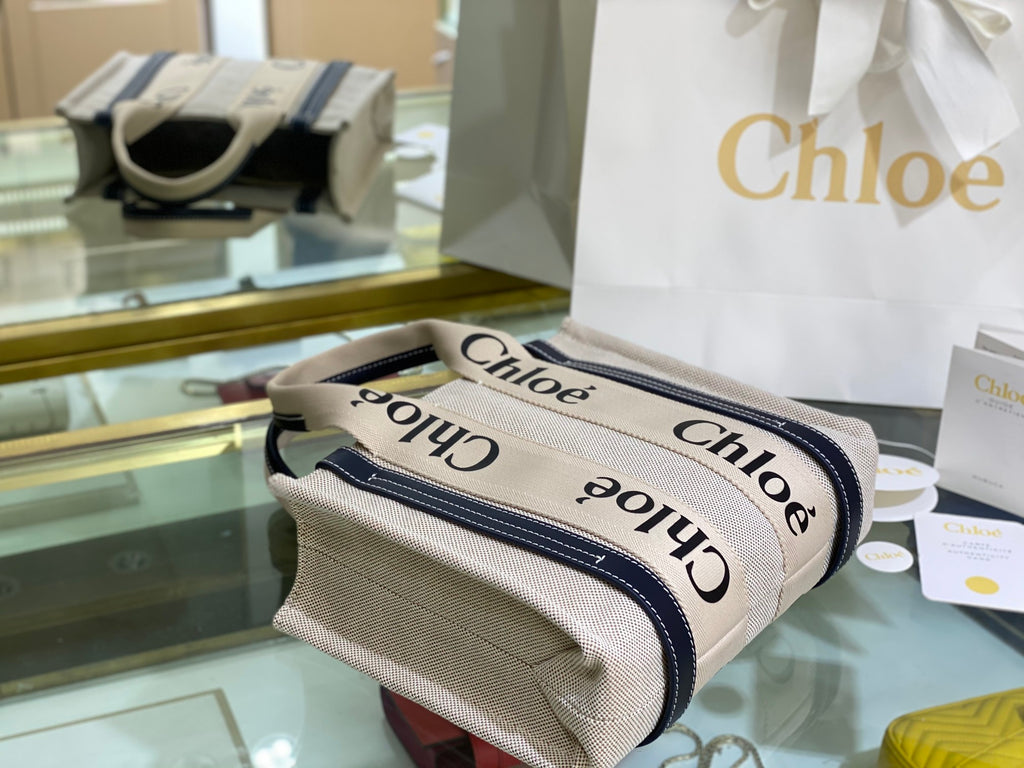 CW small navy leather-trimmed cotton-canvas tote