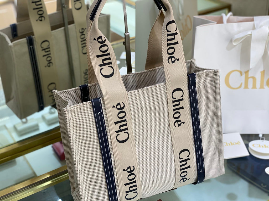 CW medium navy leather-trimmed cotton-canvas tote