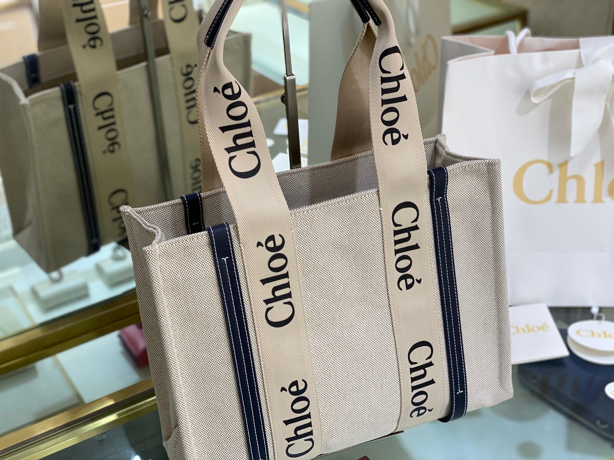 CW medium navy leather-trimmed cotton-canvas tote