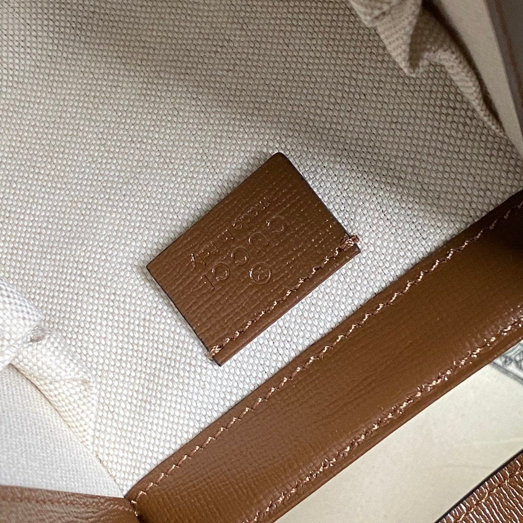 Beige canvas mini top handle bag