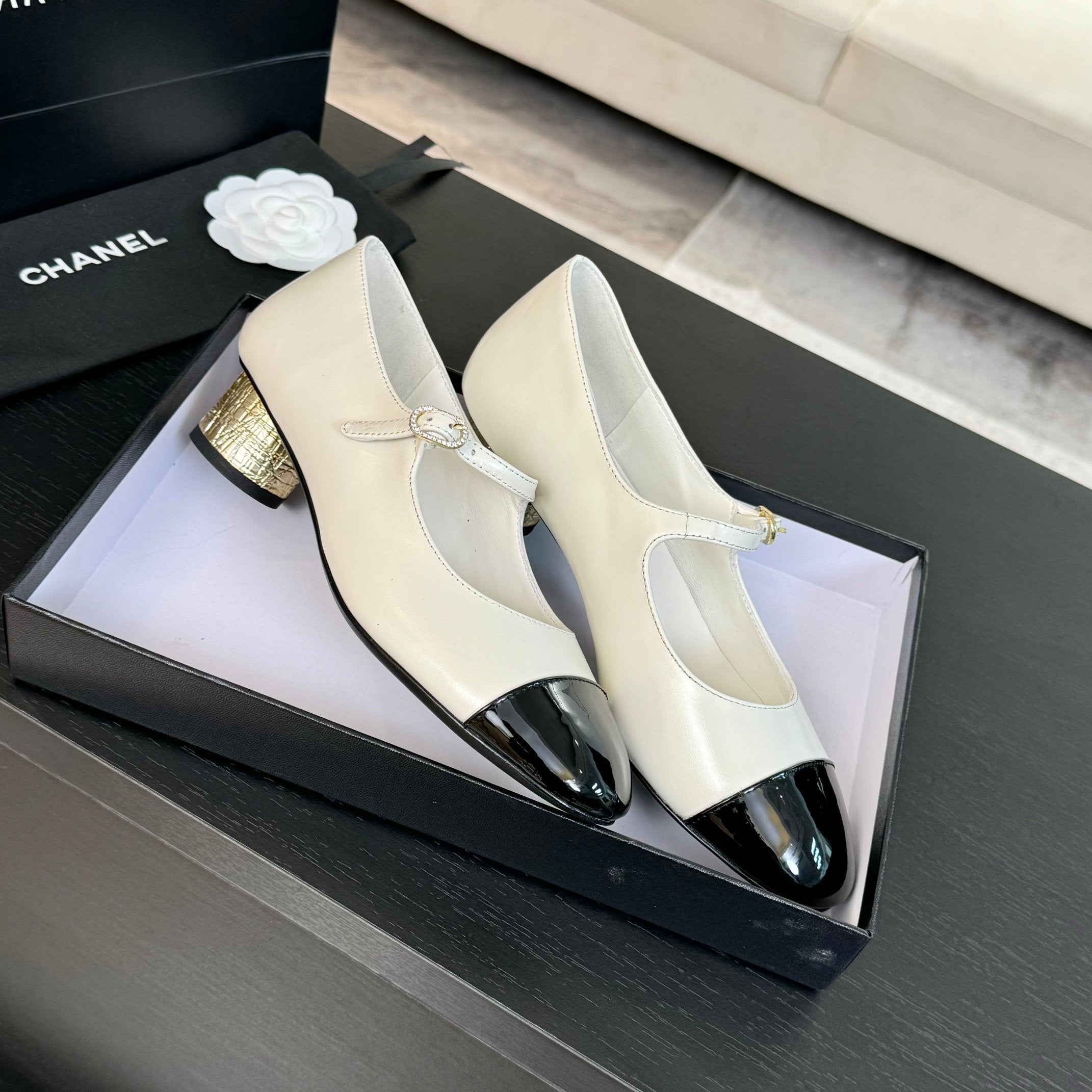 Ivory And Black MJ Pumps