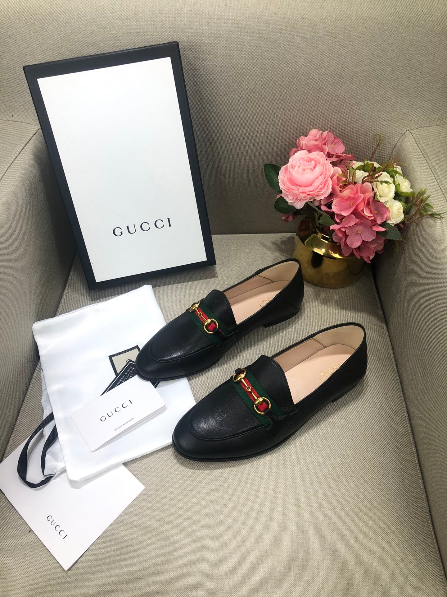 Black loafer with web