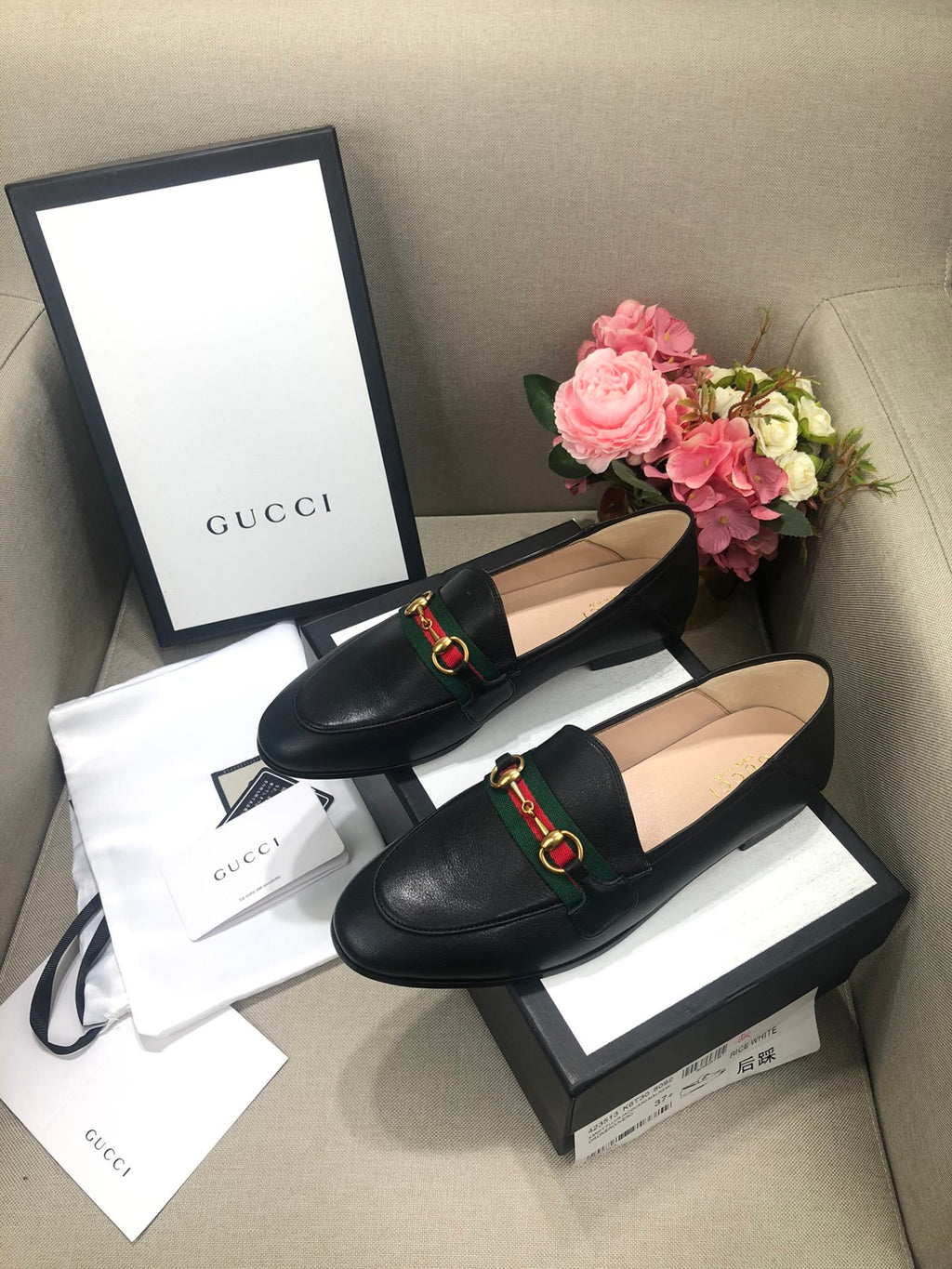 Black loafer with web