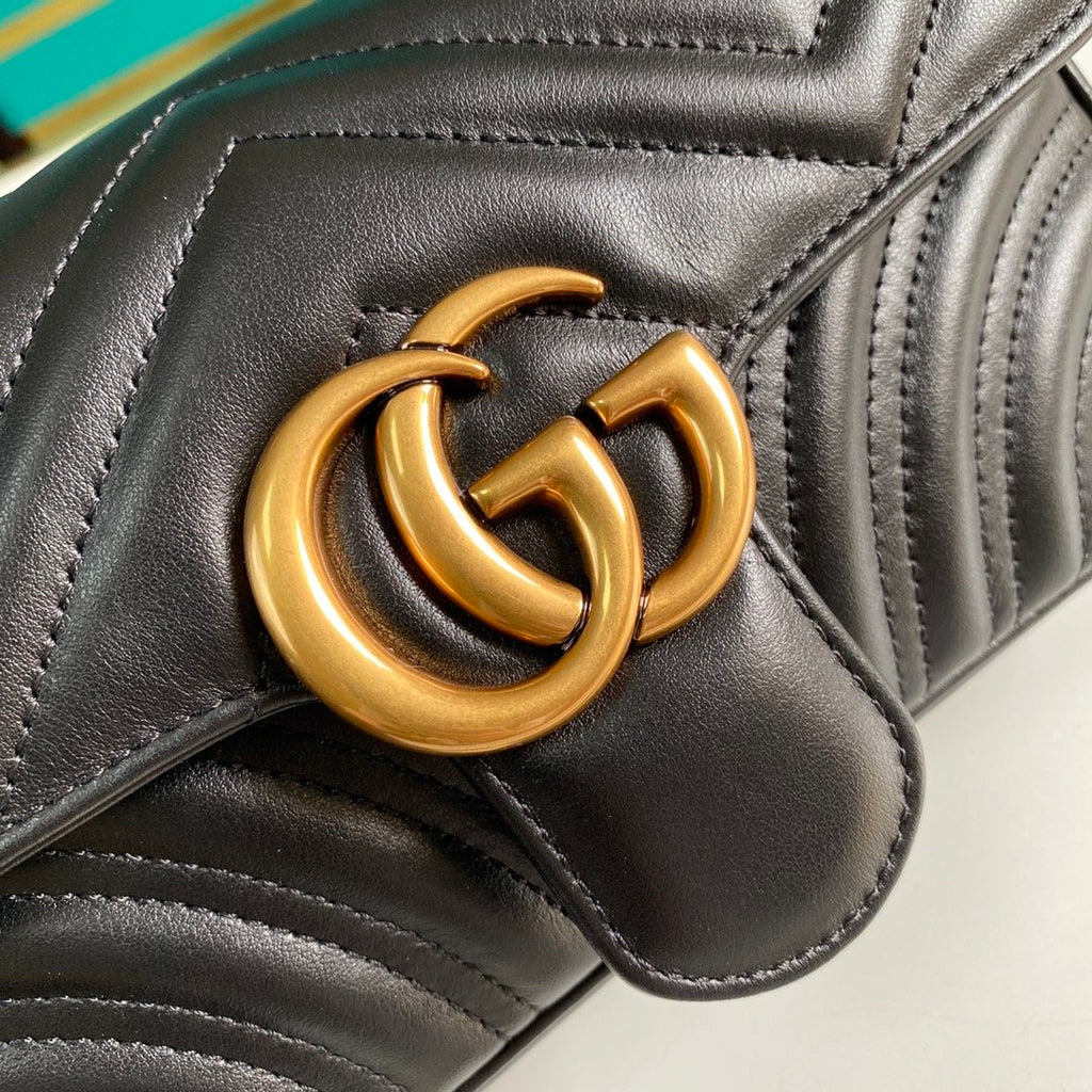 Black GM mini shoulder bag