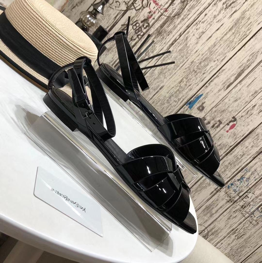 YT flat sandals in Black patent leather