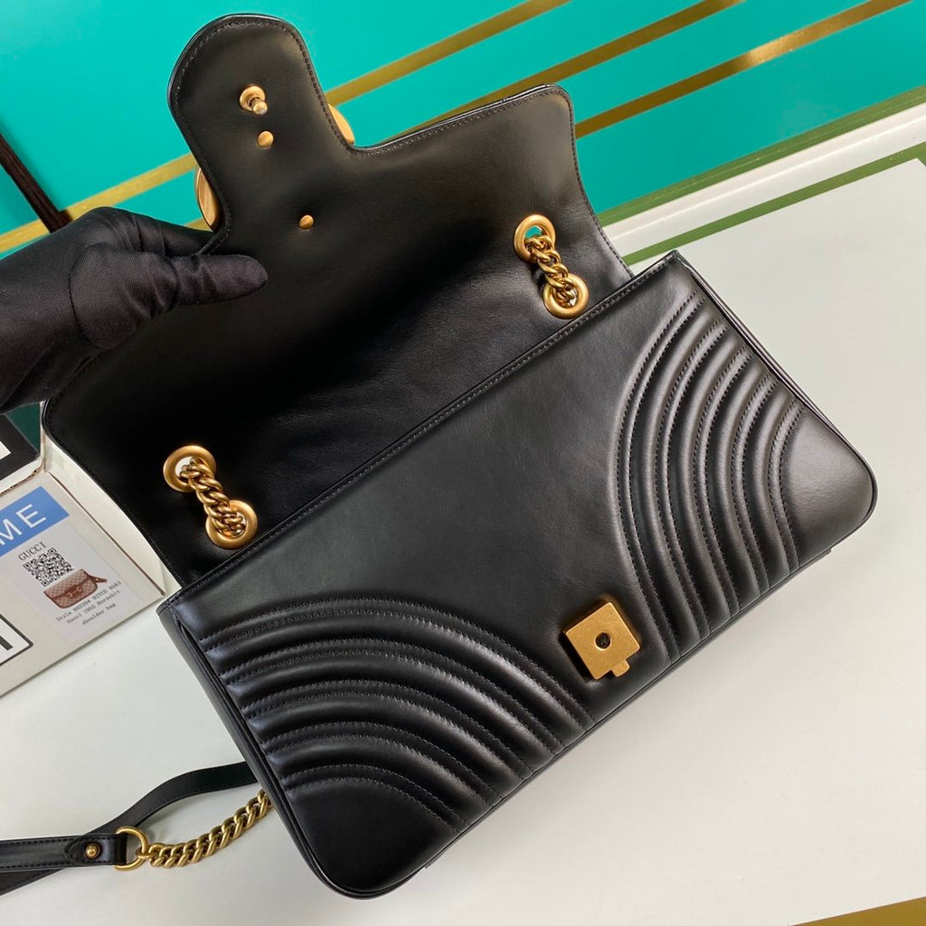 Black GM medium shoulder bag