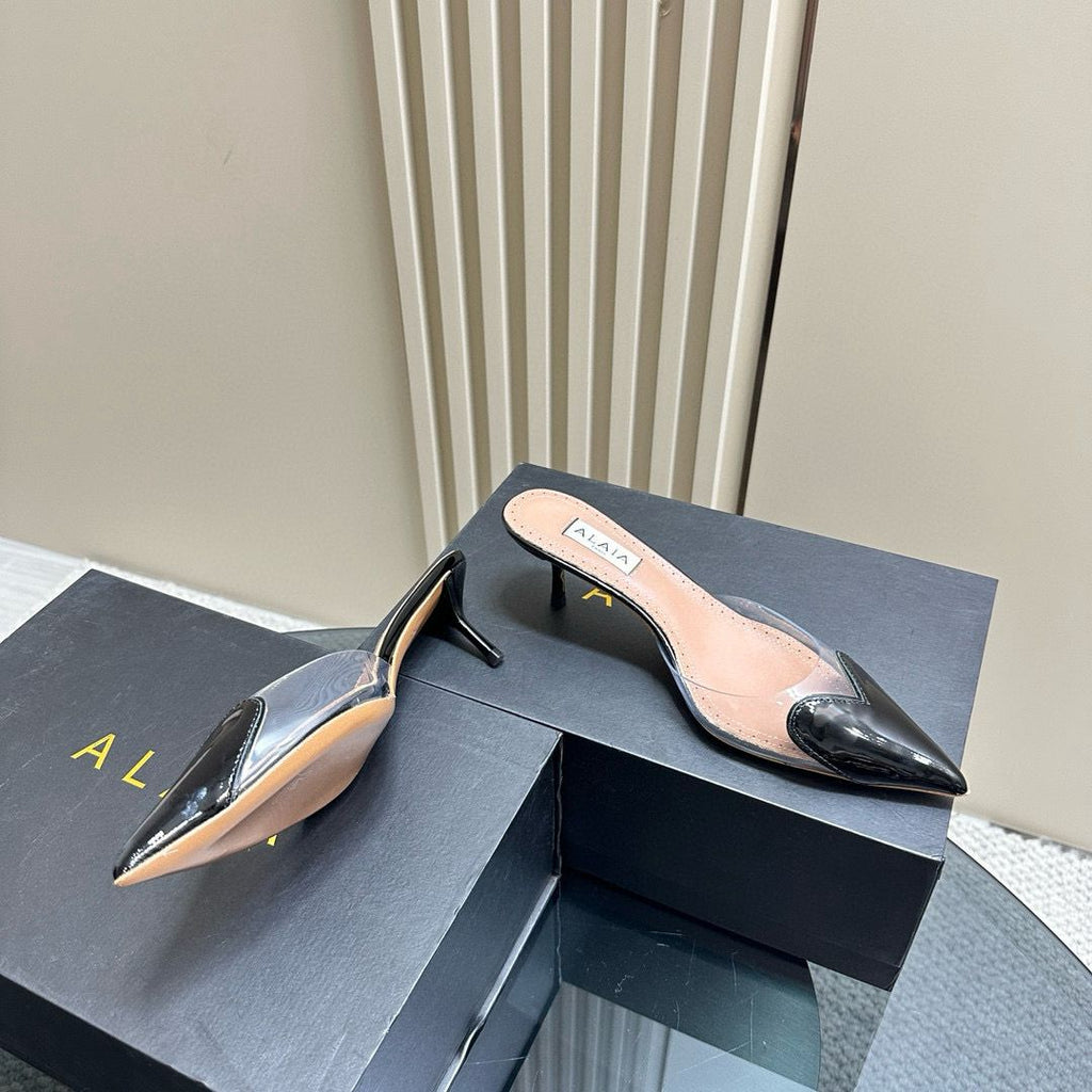 Black LC Mules In Patent Leather
