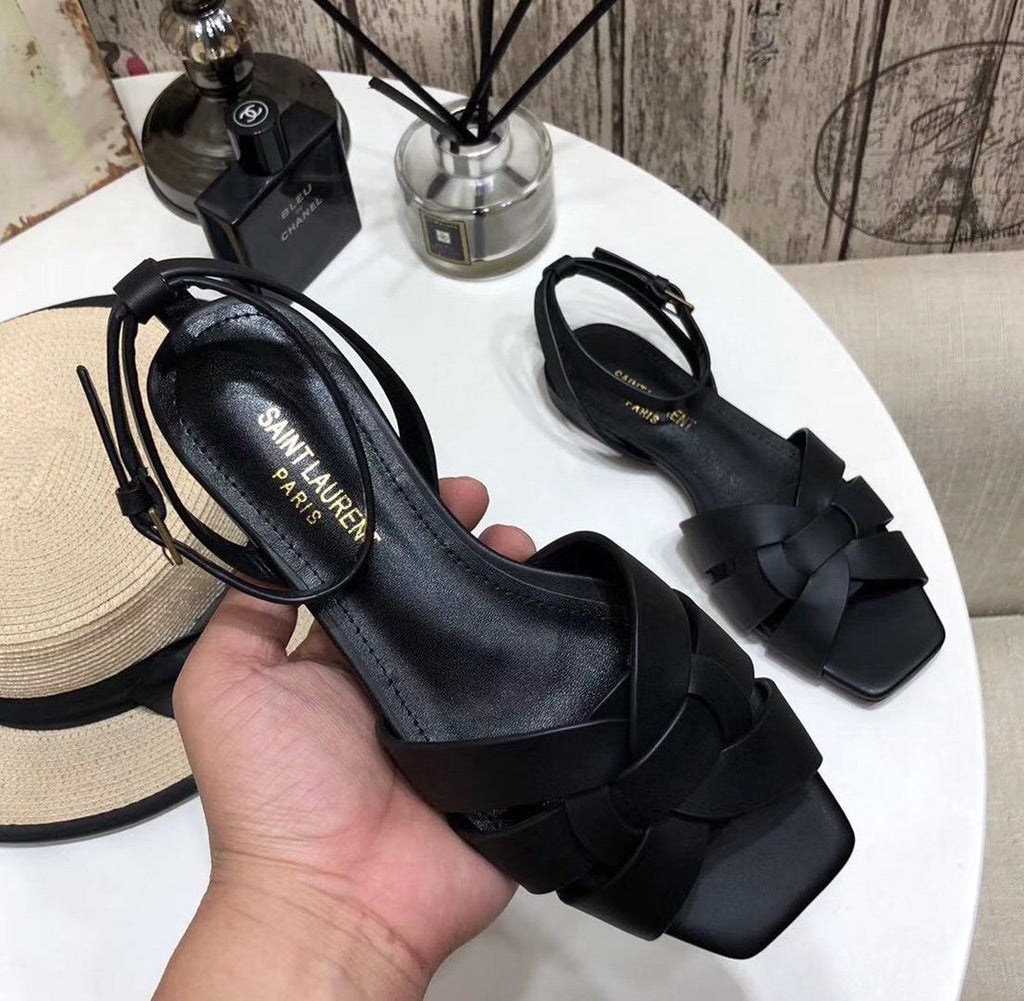 YT flat sandals in black leather