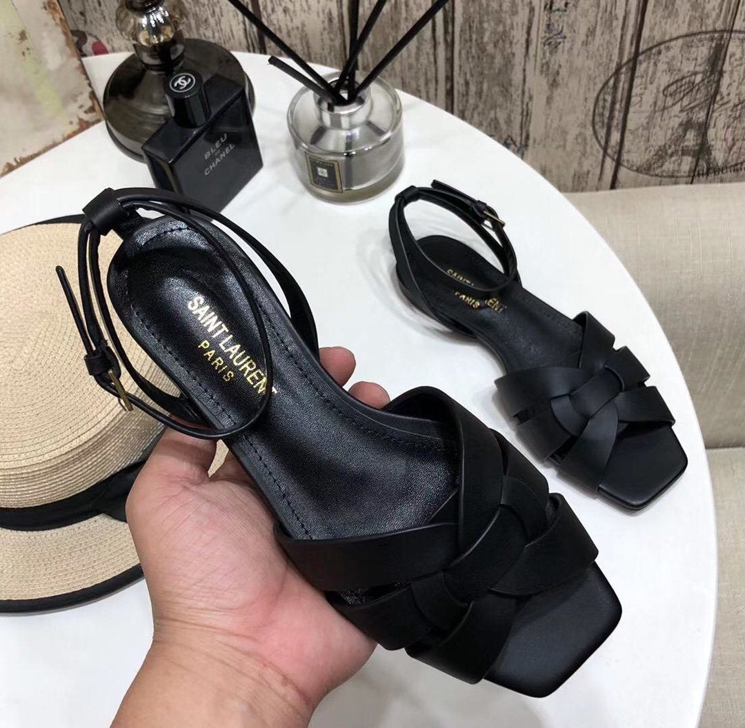 YT flat sandals in black leather