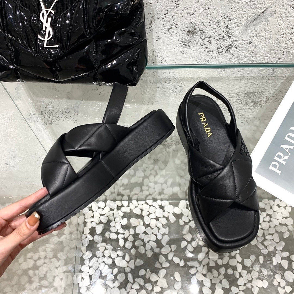 Black quilted flatform sandals