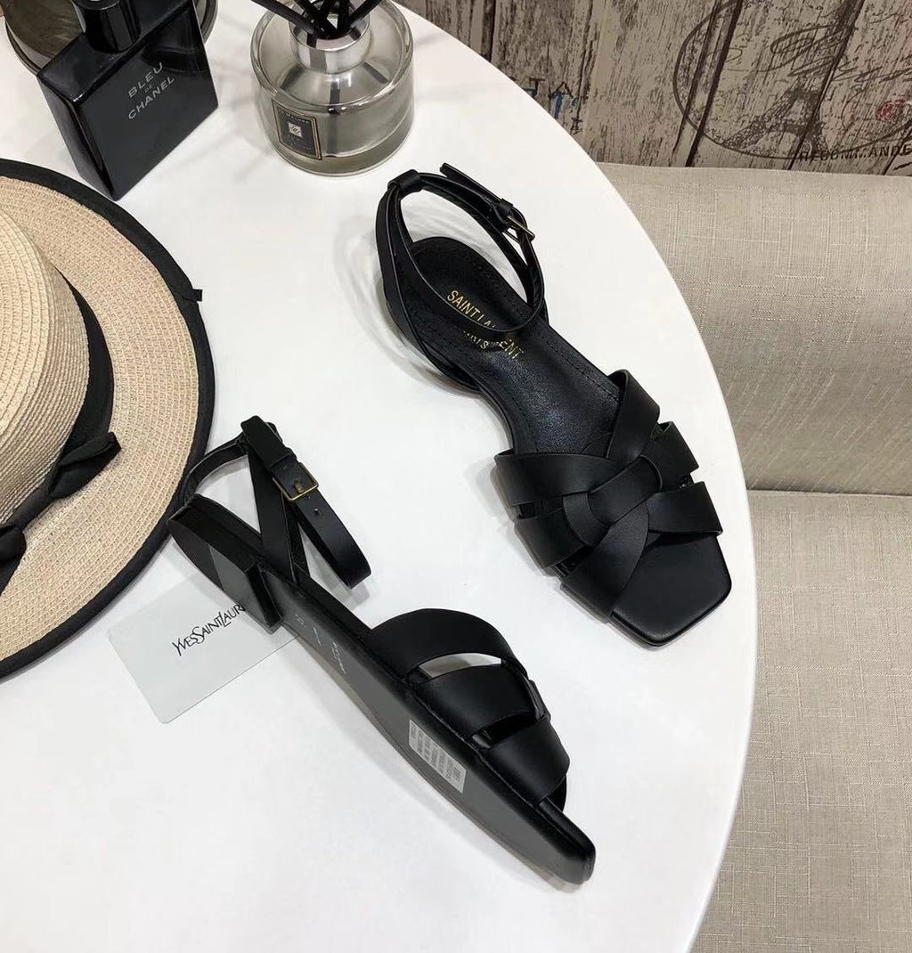 YT flat sandals in black leather