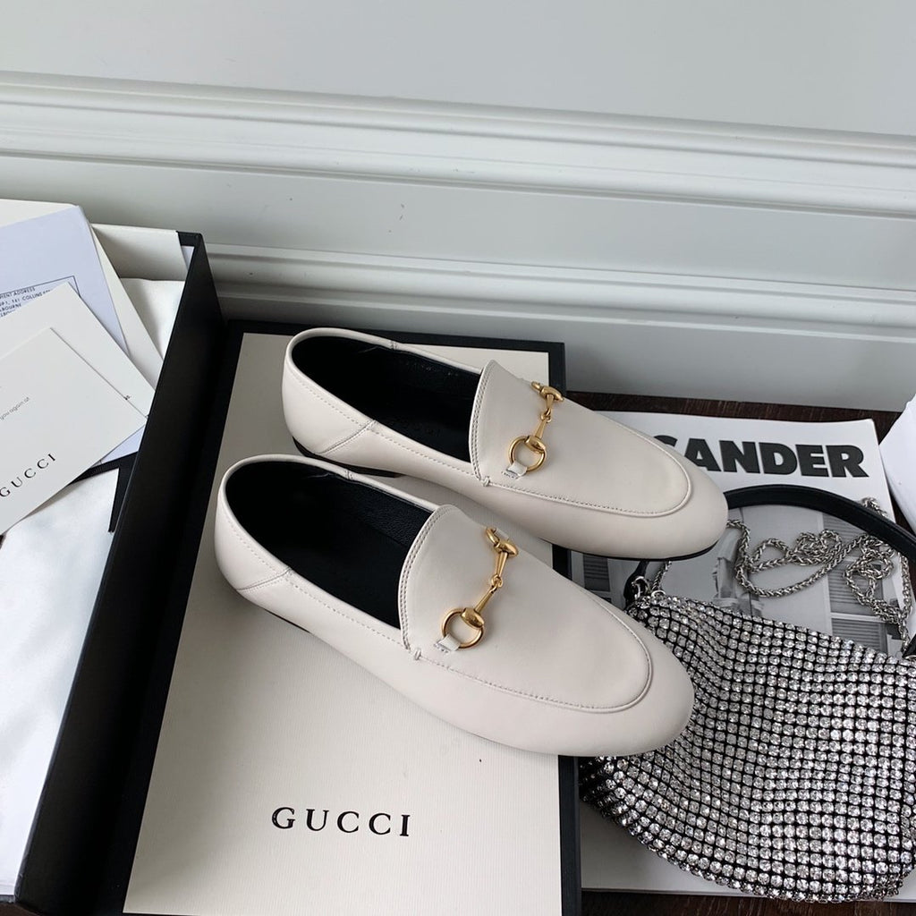 White leather loafer