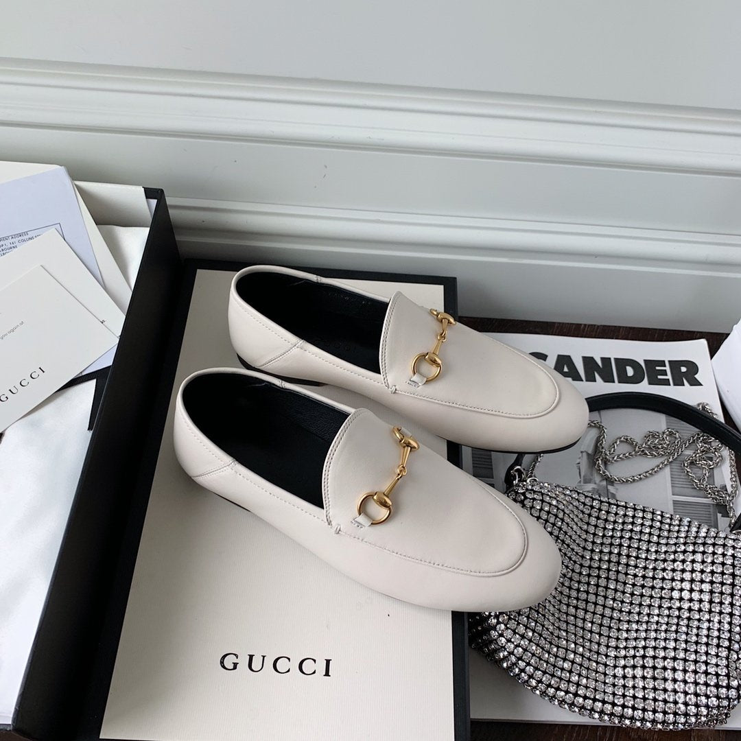 White leather loafer