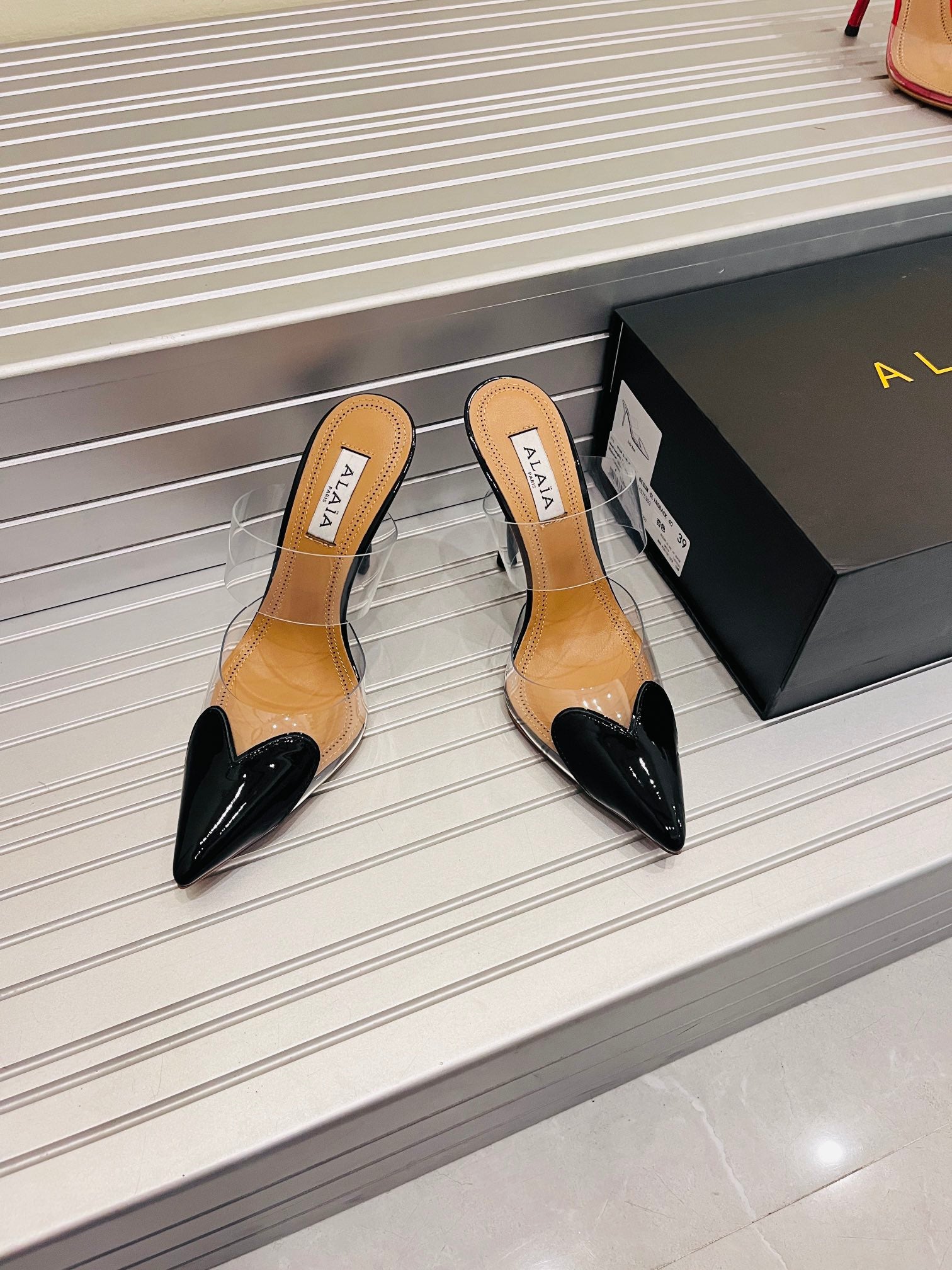 Black LC Mules In Patent Leather